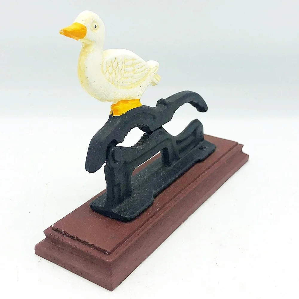 Cast Iron White Duck Nutcracker On Wooden Base